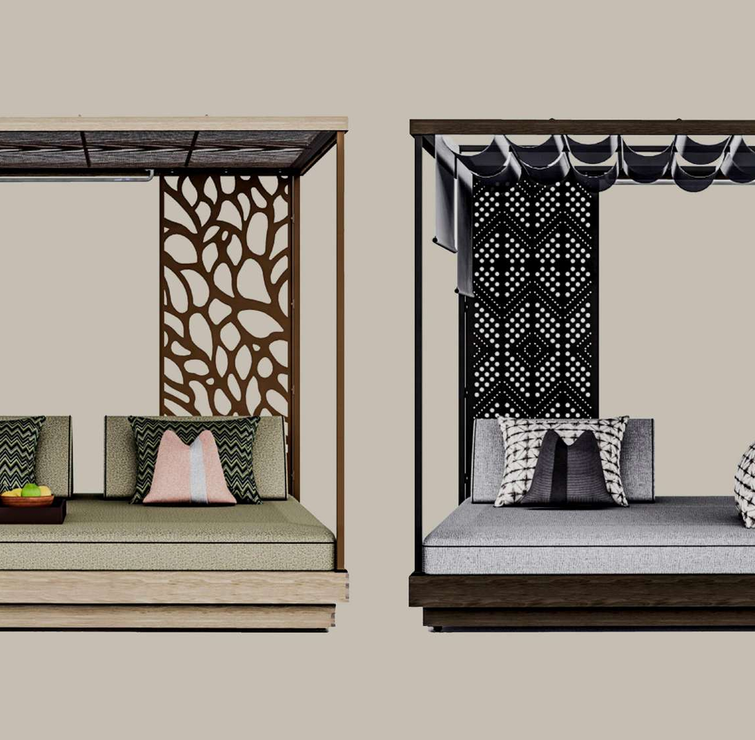 Two modern outdoor daybeds under canopy frames shown side by side on a plain beige background. The left daybed has a light wood frame, a green cushioned seat, dark brown decorative wall panels, and patterned pillows including pink and green.