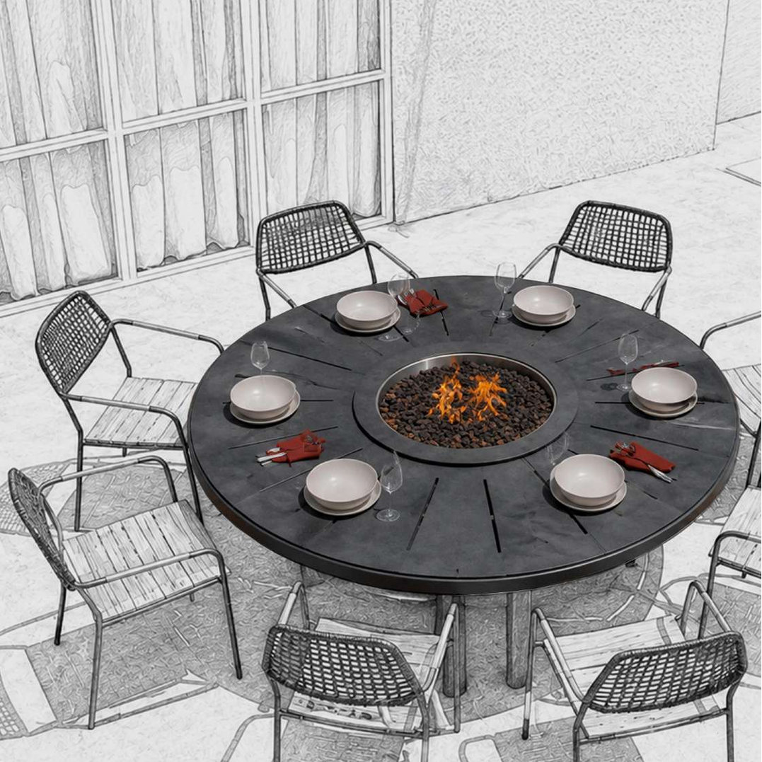 A round black outdoor fire pit dining table with six matching black mesh chairs, shown on a patio. The table has plates, napkins, and a central fire bowl, with a stylized black-and-white background rendering of the patio setting.